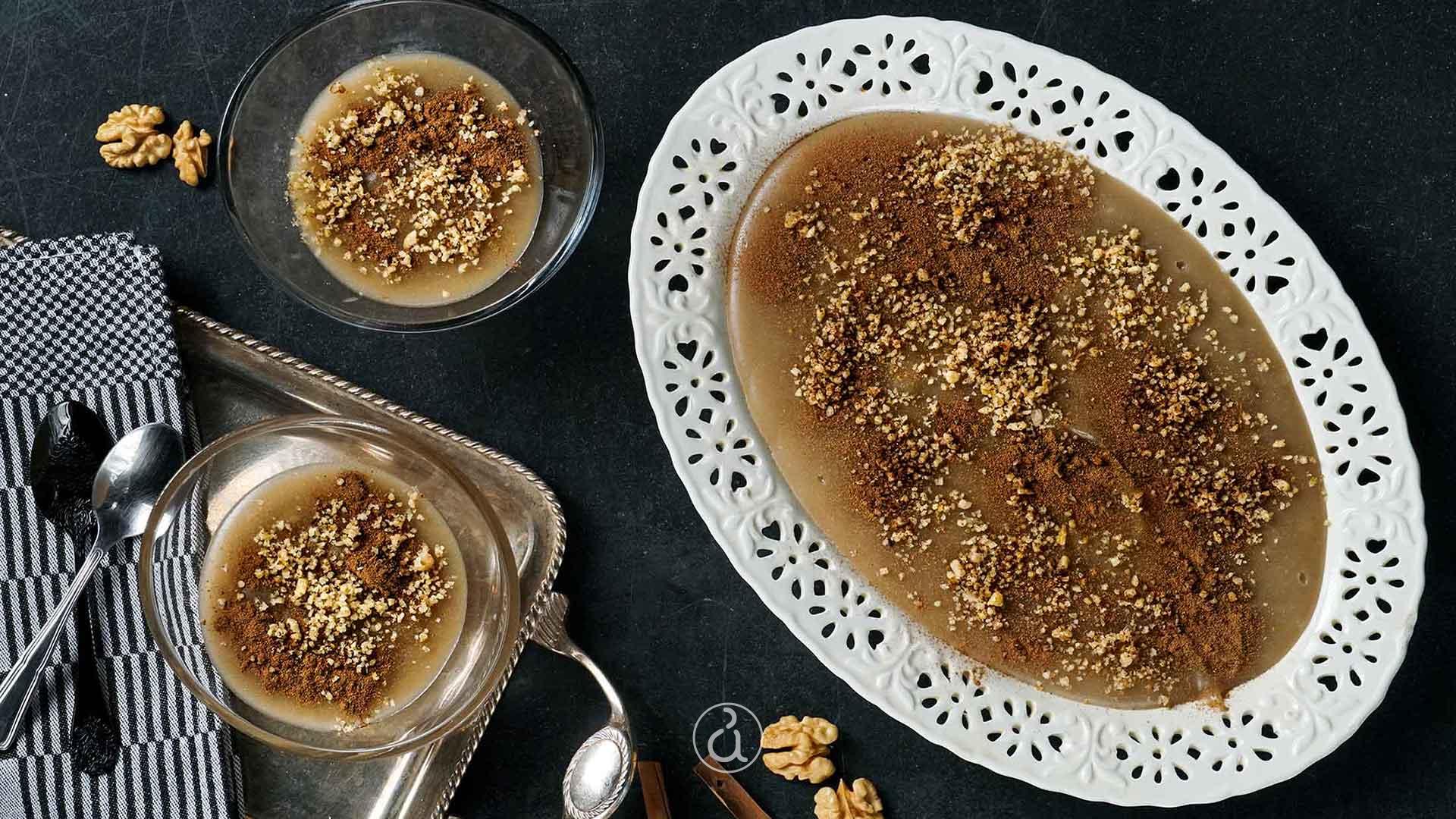 Traditional Greek mustalevria served in a bowl with sesame seeds and walnuts – Samos specialty
