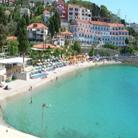 Gagkou Beach in Samos with calm water, sunbeds and cafés near Vathy