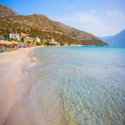 Psili Ammos Beach in Samos with golden sand and shallow turquoise water